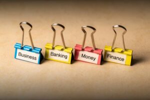 A picture of large clips in different colors for organizing business finances