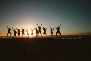 How to give your employees a boost - employees are jumping in the air enjoying themselves