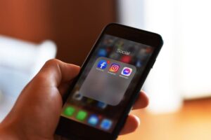 Person using phone to look at social media