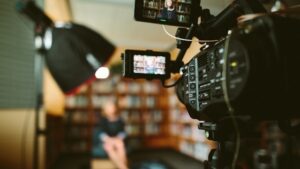 person is filming a video to create their personal brand