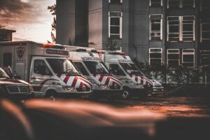 Picture of ambulances lined up side by side depicting a frontline career